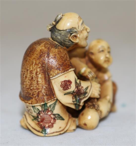 A Japanese ivory polychrome decorated netsuke, first half 20th century, height 4cm